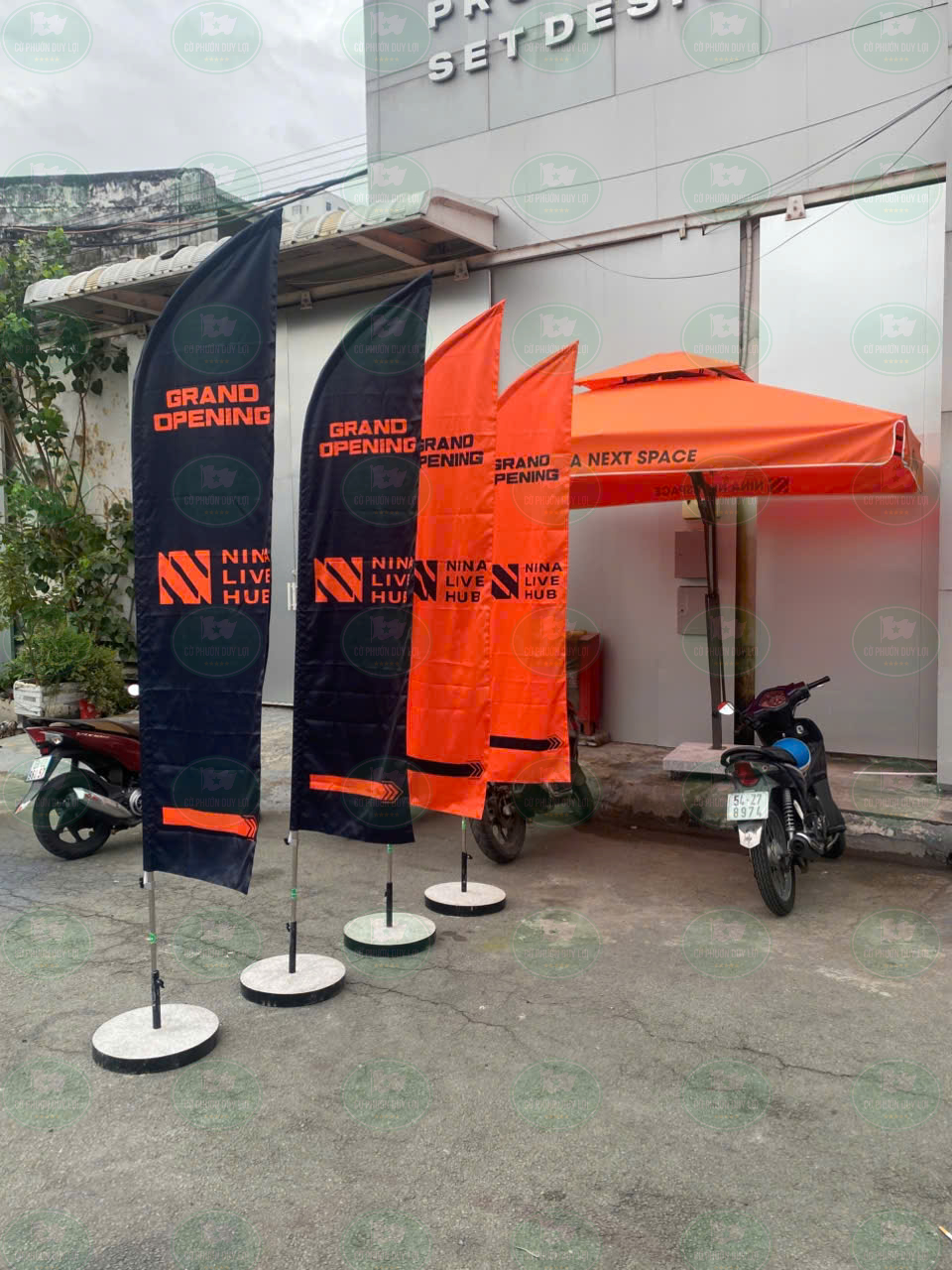 Mẫu cờ phướn cánh buồm Grand Opening